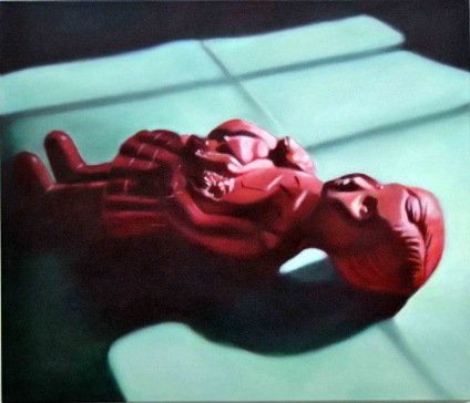 Still-life with red doll