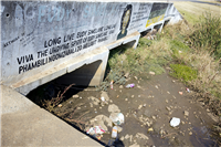 Eudy's portrait painted by fellow activists on the bridge wall in Tornado, KwaThema, few meters away from where her body was discovered on 28th April 200