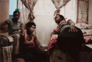 Guy Tillim, Tshililo (right) and her friends share a one-roomed apartment in Cape Agulhas, Esselen Street, Hillbrow. Pigment inks on archival cotton rag paper, 42 x 59.4 cm